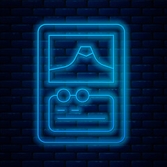 Poster - Glowing neon line Card game collection icon isolated on brick wall background. Fantasy ui kit with magic items. Vector