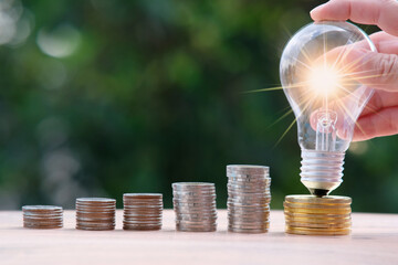 Poster - stack of coin on table background and saving money and business growth concept, finance and investment concept