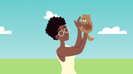 Wall Mural - afro woman lifting cat mascot in the field