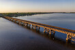 © AmazingAerialAgency - Aerial view of a railroad bridge crossing Saint Sebastian River in Sebastian, Florida, United States.