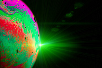 Wall Mural - Colorful bubbles. Globe planet earth in galaxy universe space with abstract sun on black background. Astronomical scientific concept.