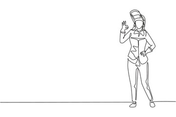 Wall Mural - Single one line drawing female welder stands with gesture okay and face shield is removed ready to work in his iron workshop. Success business. Continuous line draw design graphic vector illustration