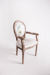 White vintage chair with wood trim on white background