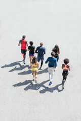 Wall Mural - Group of runners running. Top view and Rear view.