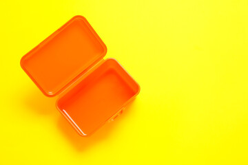 Plastic lunch box on color background