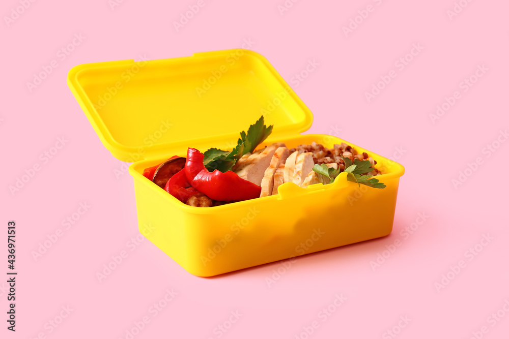 Lunch box with tasty food on color background