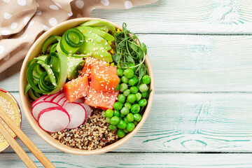 Wall Mural - Poke bowl with salmon, cucumber and avocado