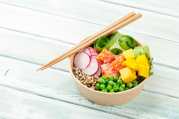 Wall Mural - Poke bowl with salmon, cucumber and mango