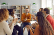© Studio Romantic - Happy diverse people applauding mature man in group therapy. Team of grateful patients thank therapist for good psychological help session. Success, positive encouragement, overcoming problems concept