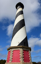 Black And White Striped  Relocated Cape Hatteras Lighthouse On A Sunny Spring Day On The Atlantic Ocean Coast In Buxton, North Carolina