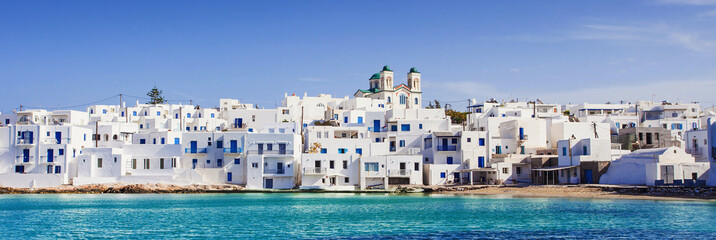 Wall Mural - Greek fishing village in Paros island, Naousa, Greece. Travel, vacations concept, banner. Panoramic view