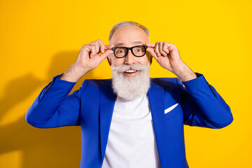 Poster - Photo of amazed happy excited old man wear glasses good mood sale isolated on yellow color background