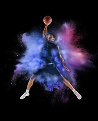 Wall Mural - One young sportsman basketball player in explosion of colored neon powder isolated on black background