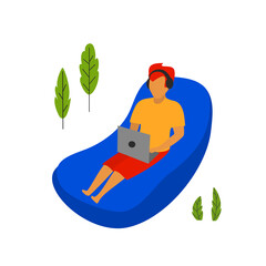 young man workoing on a laptop lying on inflatable lounge hammock