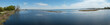 Panoramic shot of lake Erie near a forest in North America