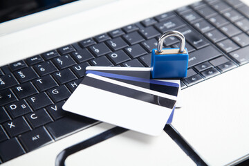 Wall Mural - Padlock and credit cards on the computer keyboard. Credit card security