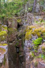 Poster - Mountainside with a rock crevice