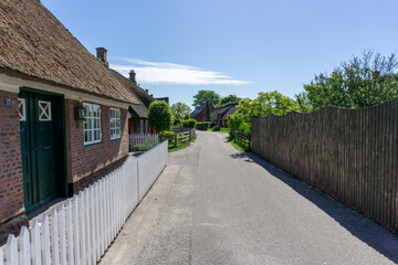 Wall Mural - picturesque village street with colorful Danish houses in Nordby on Fano Island