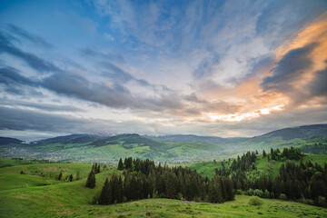 Wall Mural - amazing spring (summer) mountain landscape. blue dramatic cloudy sky. natural background