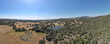 Aerial view of small lake in the valley, between farmland and forest in the town of Julian, east of San Diego, California, USA