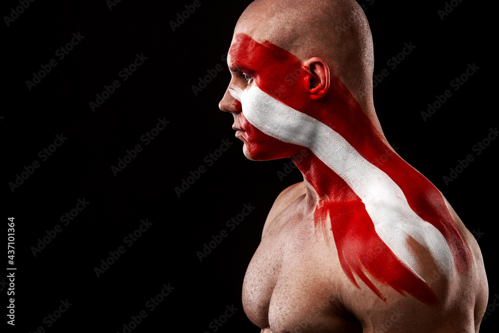 Austria fan. Soccer or football athlete with flag bodyart on face. Sport concept with copyspace. - obrazy, fototapety, plakaty 