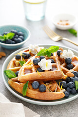 Canvas Print - Almond waffles with nuts, ricotta cheese and fresh blueberries, healthy food, breakfast. Waffles with berries.