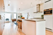 © Casa imágenes - Home interior design of modern loft apartment with open kitchen in minimalist style