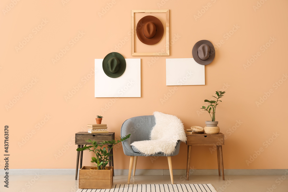Interior of stylish room with hats - obrazy, fototapety, plakaty 
