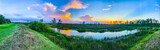 Fototapeta Zwierzęta - wild river sunset sky in nature