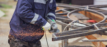 Sparks From Metal Cutting At A Construction Site. Technologies