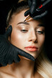 Cosmetician in gloves doing permanent makeup