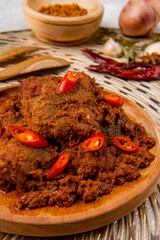 Wall Mural - Rendang Pork or Rendang babi. 

Rendang babi is often described as a rich dish of meat  that has been slow cooked and braised in a coconut milk seasoned with a herb and spice mixture.