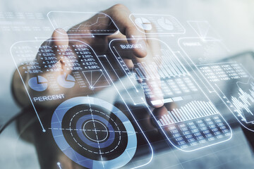 Poster - Double exposure of abstract creative statistics data hologram with finger clicks on a digital tablet on background, statistics and analytics concept