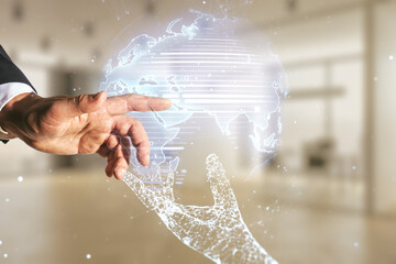 Poster - Multi exposure of man hand working with abstract creative digital world map hologram on blurred office background, tourism and traveling concept