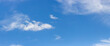 © malshak_off - Panorama of low cloud blue sky.