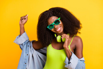 Sticker - Photo portrait of young woman laughing wearing sunglass denim shirt greet singlet isolated vivid yellow color background