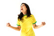 © DadoPhotos - Sport fan Cherring. Beautiful brunette girl in yellow uniform. Woman celebrates sports and game over white background.