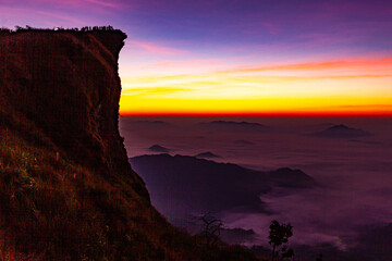 Wall Mural - Beautiful landscape nature on peak mountain with sunrise in winter at viewpoint Phu Chi Fa
