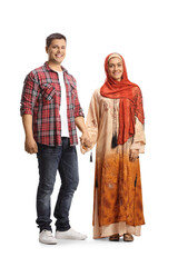 Canvas Print - Full length portrait of a mixed religion couple holding hands