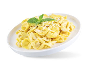 Fresh prepared Tortellini pasta with basil on a white isolated background