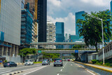 Fototapeta  - Jakarta city landscape with moderate traffic during the day. Vibrant and futuristic city