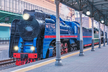 Wall Mural - Retro train stands by the platform. Moscow.