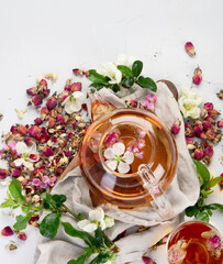 Sticker - Rose tea with cups and teapot on light gray backround.