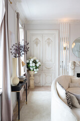 Wall Mural - rich luxurious interior of a cozy room with modern stylish furniture nd grand piano, decorated with baroque columns and stucco on the walls