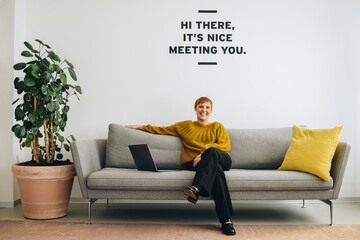 Businesswoman sitting in lobby