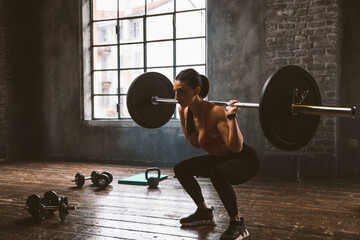 female bodybuilder training at the gym