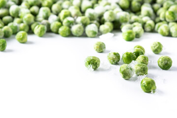 Frozen green peas isolated on white background. Copy space