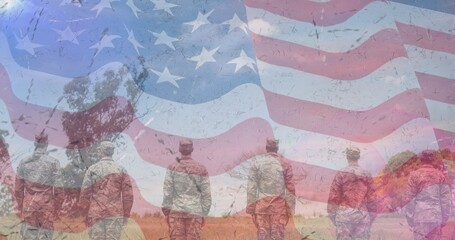 Poster - Composition of male soldiers standing at attention over american flag