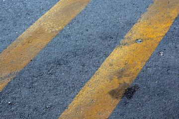 yellow lines on asphalt