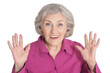 © aletia2011 - Surprised  senior woman posing against white background